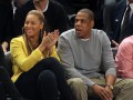 Бейонсе і Jay-Z на баскетбольному матчі